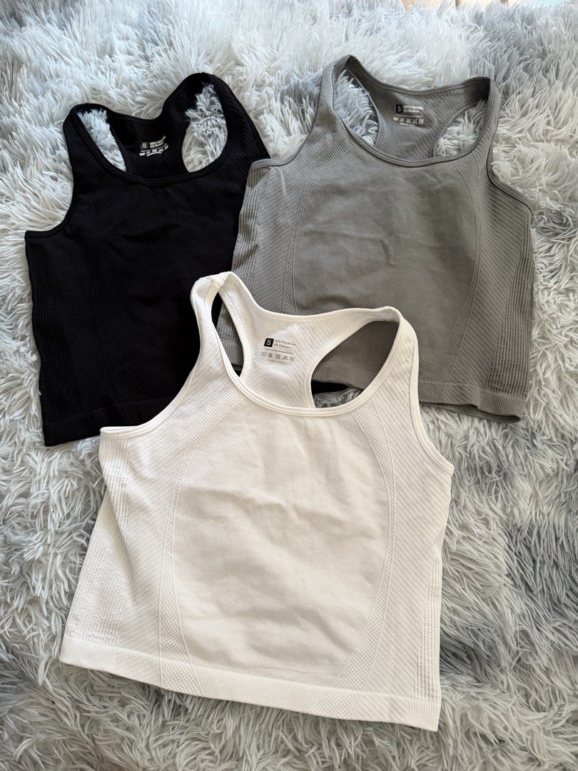 Ribbed Tank Tops Set (Category: Sleeveless) located in Legazpi City. Submitted by chindecluttrs (Listing ID 1466202417, Image 1). Description: - Bundle of 3: Black, grey, and white - Size: Small - Design: Racerback with seamless knit pattern - Material: Stretchy and comfortable .