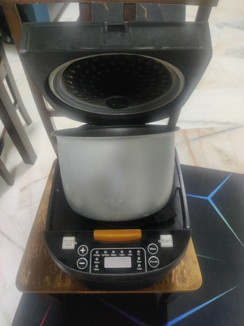 Rice cooker Multi Function. (Category: Cookers) located in Kuala Lumpur. Submitted by newtree.5d14b8 (Listing ID 1466330325, Image 3). Description: Masih Boleh pakai, bfungsi baik. cuma saran kan beli periuk besi untuk pakai, sbb yg ori dh bkarat..