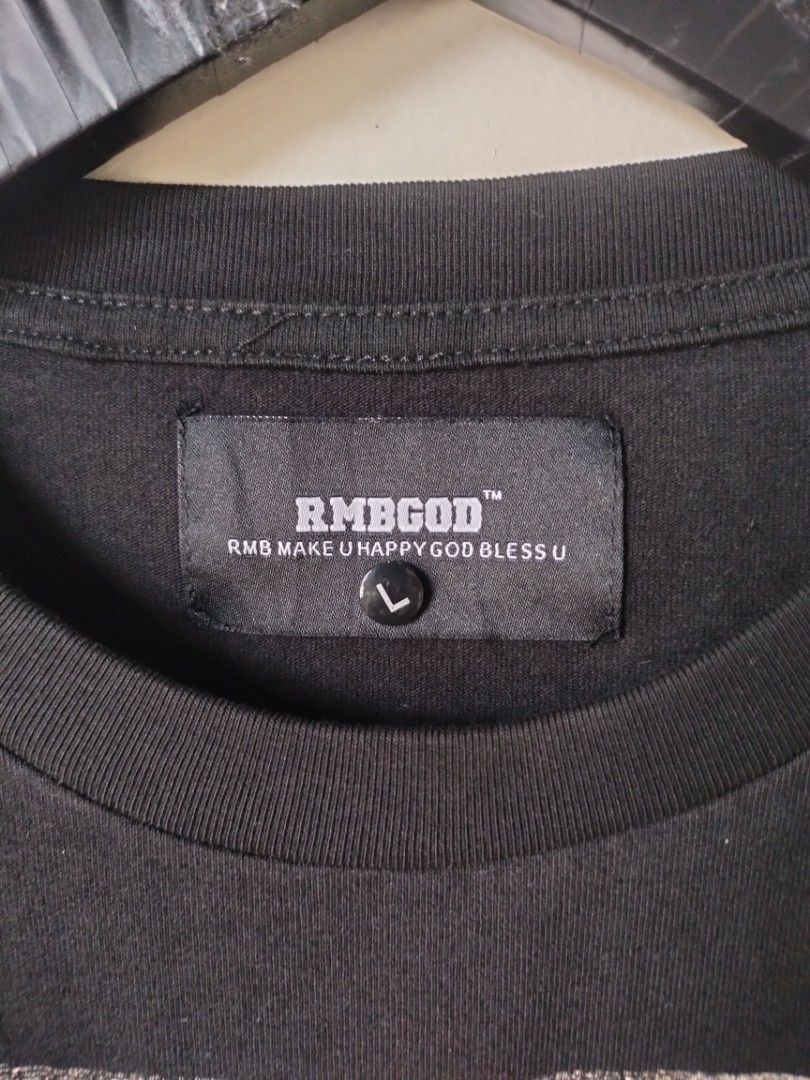 RMBGOD (Category: Tshirts & Polo Shirts ) located in Calbayog City. Submitted by mr.thrifter_ph. (Listing ID 1466230708, Image 3). Description: RMBGOD - LARGE - Width 23 - Length 30 - Good Condition - NO ISSUE.