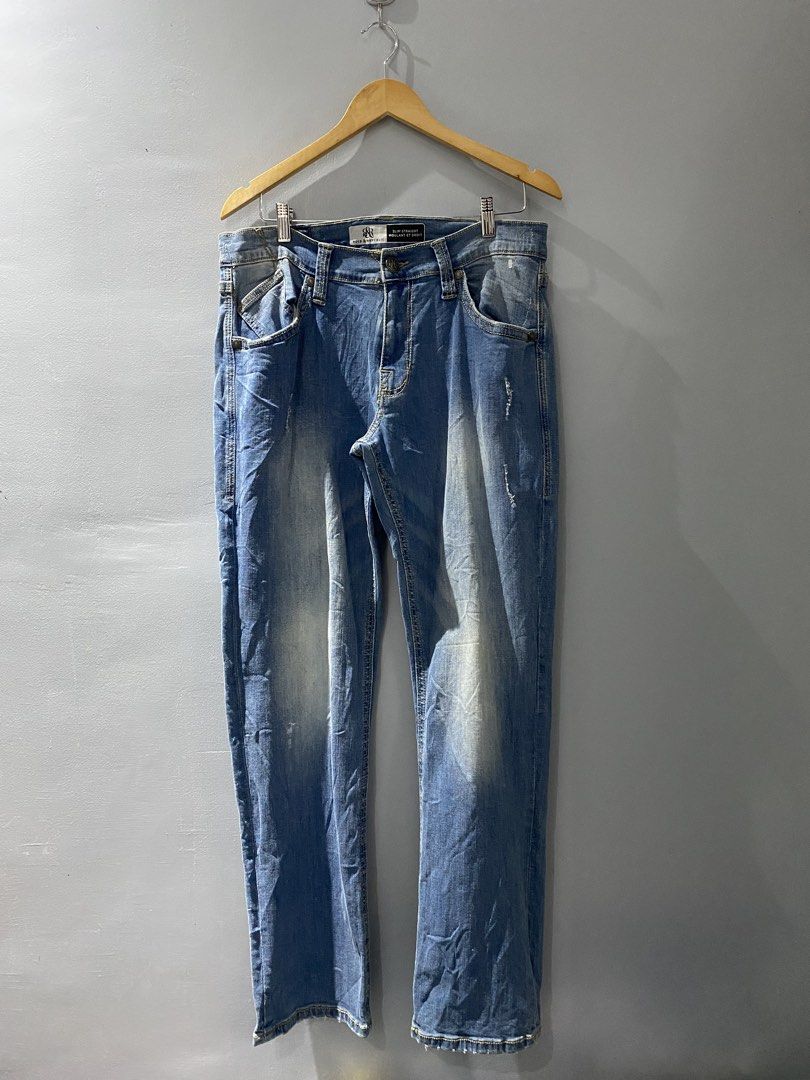 Rock & Republic Slim Straight Jeans (Category: Jeans) located in Bangued. Submitted by koroysthrifts (Listing ID 1466296039, Image 2). Description: - Brand: Rock & Republic 34-36x41x8 - Style: Slim straight jeans - Color/Wash: Medium blue with stylish faded whiskering - Details: Iconic embroidered R logo on back pockets, branded metal hardware, and contrast stitching - Fit: Comfortable denim fabric with a classic 5-pocket design.