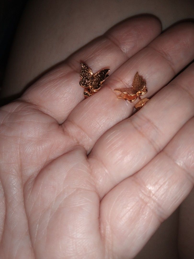 Rose Gold Butterfly Stud Earrings (Category: Earrings) located in Quezon City. Submitted by eidorableshop (Listing ID 1466162330, Image 2). Description: - Elegant rose gold butterfly stud earrings - Textured surface that beautifully catches the light - Secure post backs for all-day wear - Versatile design suitable for both casual and dressy outfits - Perfect everyday accessory or gift idea.