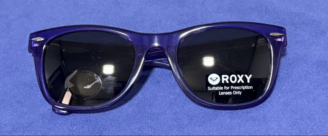 ROXY Purple Prescription Ready Sunglasses (Category: Sunglasses & Eyewear) located in Dasmarinas. Submitted by toyang50 (Listing ID 1466204757, Image 1). Description: Brand new ROXY purple frame sunglasses with original lens stickers intact. Features gold ROXY logo plates on the temples and demo lenses suitable for prescription use. Never worn!.