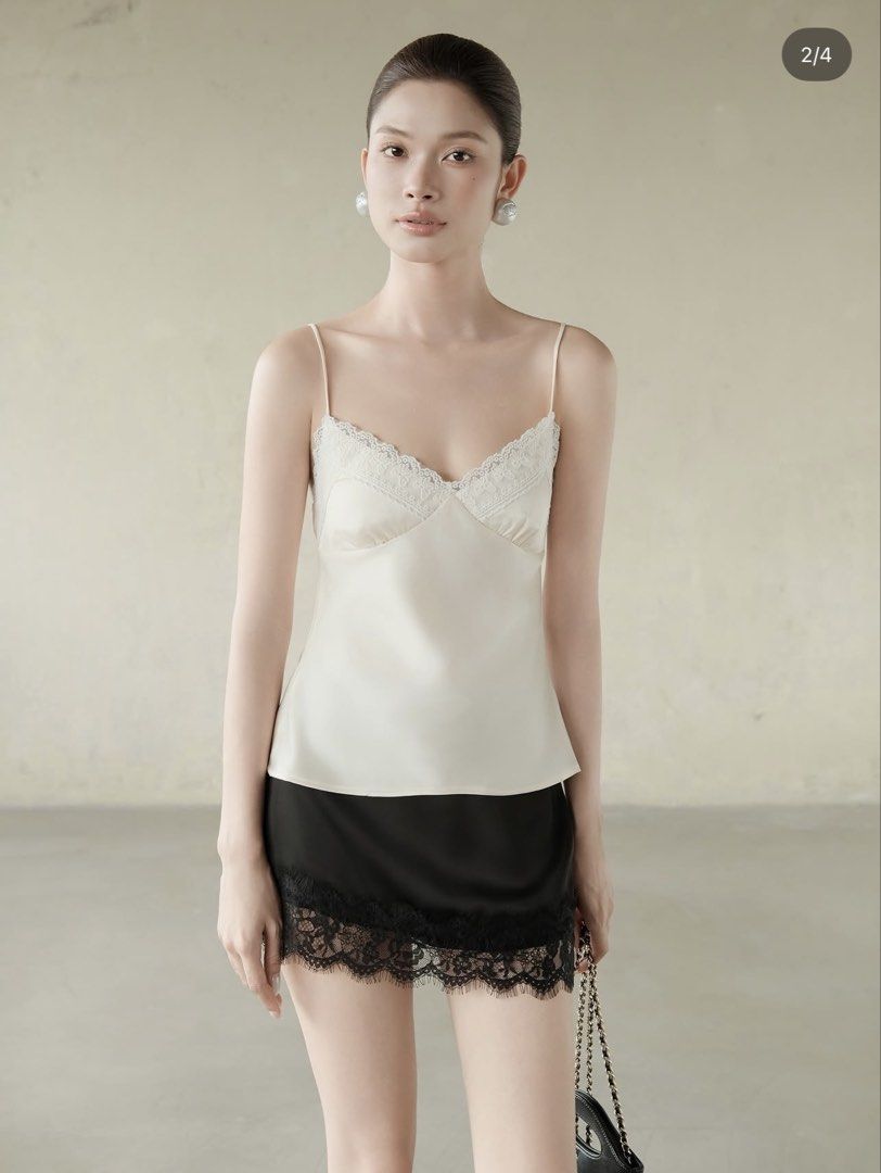 Rubies Satin Lace Top (Category: Sleeveless) located in Santa Rosa. Submitted by kv_declutter (Listing ID 1466286869, Image 1). Description: - can fit 34 bust | 27-28 waist - Gathered elastic shirring on the upper back for flexible comfort - Worn only once for a photo shoot, essentially brand new.