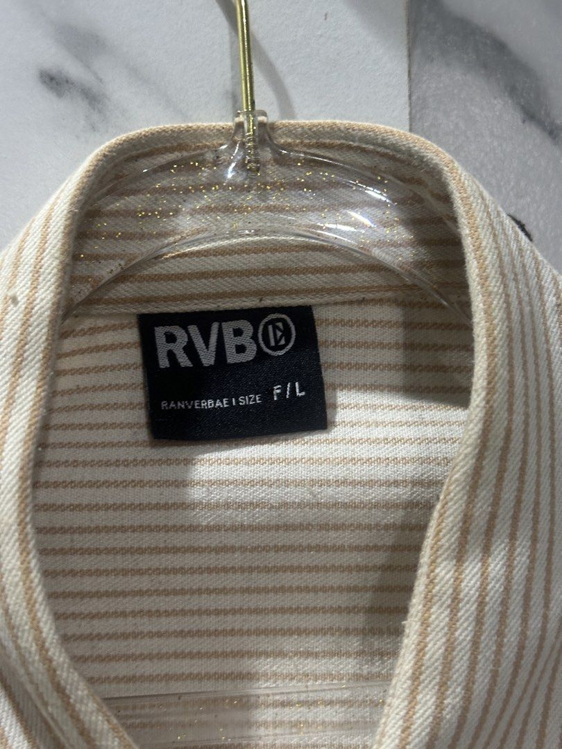 RVB Striped Chinese Inspired Yellow Jacket (Category: Coats, Jackets and Outerwear) located in Baguio. Submitted by miss_misery (Listing ID 1466255386, Image 3). Description: - Brand: RVB (Tags attached) - Made in Vietnam - Color/Pattern: Beige and white stripes - Design: Collared neckline, button-up front, unique metal chest clasp, and leather back patch - Sleeves: Long sleeves with button cuffs - Fit: Relaxed fit, ideal for layering during tran