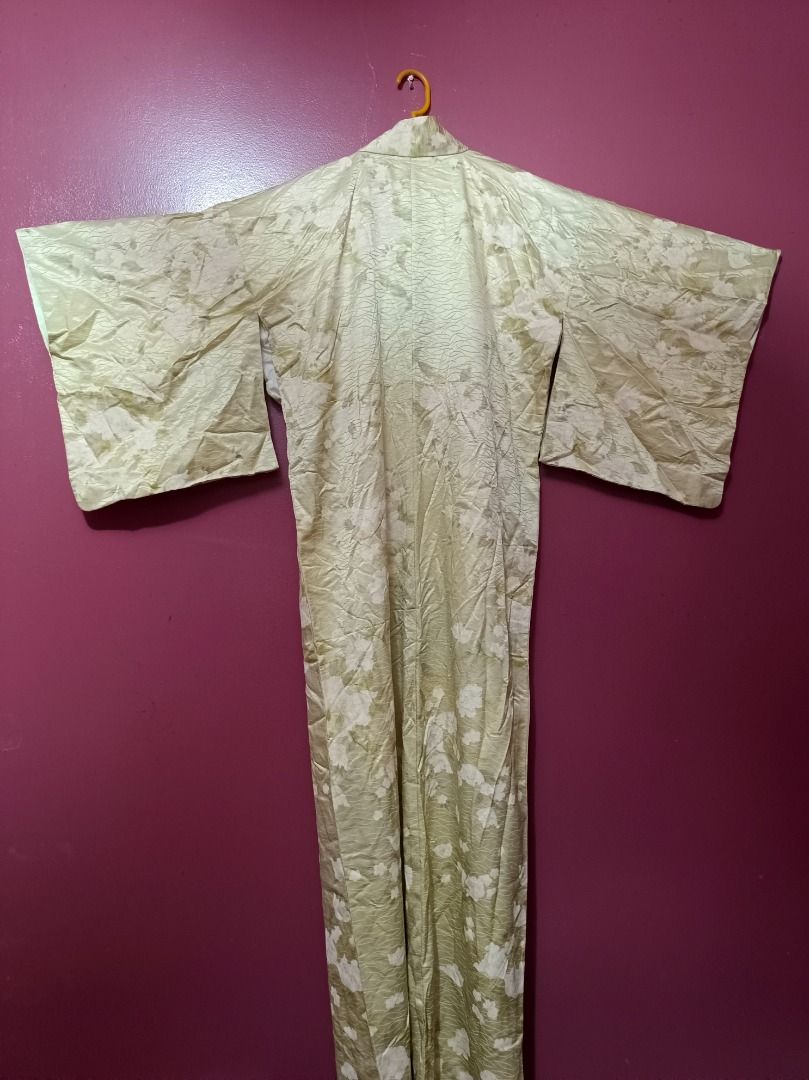 Sage Green Floral Patterned Kimono Robe (Category: Dresses) located in Makati City. Submitted by nyxhemera26 (Listing ID 1466291184, Image 2). Description: Sage Green Floral Patterned Kimono Robe - Style: Traditional open-front kimono with flowing wide sleeves - Details: Contrast light green and white inner lining - Material: Smooth, silky fabric texture - Versatility: Great layering piece for casual outfits or loungewear - Condition: Excellent -