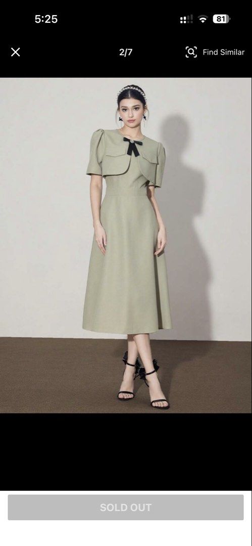 Sage Green Midi Dress with Black Bow Accent (Category: Dresses) located in Quezon. Submitted by cjstaana08 (Listing ID 1466242536, Image 1). Description: - Color: Sage green - Size: L (refer to product chart photo for exact measurements) - Style: Midi dress with matching cropped top overlay - Details: Black ribbon bow with crystal brooch center at the neckline - Fit & Fabric: Regular fit, flared skirt hitting mid-calf, zero stretch - Condition: B