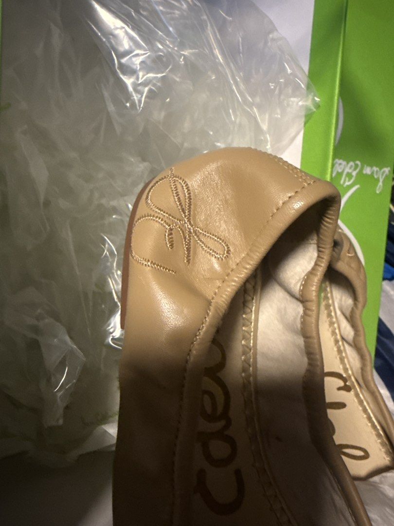 Sam Edelman Ballet Flats - Beige Leather (Category: Community) located in Angeles City. Submitted by migs_font29 (Listing ID 1462433570, Image 2). Description: - Brand: Sam Edelman - Style: Ballet Flats - Material: Beige Leather - Features: Cute bow detail with a small charm on the front - Insole: Printed with brand name - Condition: Brand new - Packaging: Comes with original box - Availability: Multiple sizes available.
