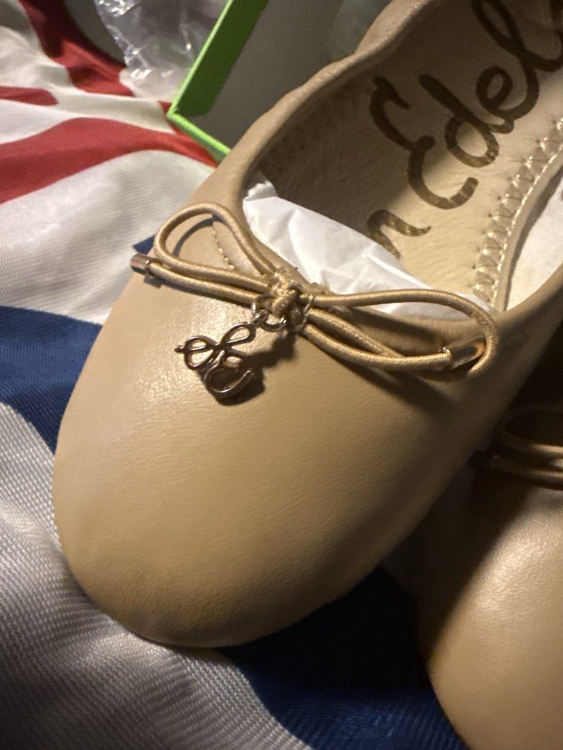 Sam Edelman Ballet Flats - Beige Leather (Category: Community) located in Angeles City. Submitted by migs_font29 (Listing ID 1462433570, Image 3). Description: - Brand: Sam Edelman - Style: Ballet Flats - Material: Beige Leather - Features: Cute bow detail with a small charm on the front - Insole: Printed with brand name - Condition: Brand new - Packaging: Comes with original box - Availability: Multiple sizes available.