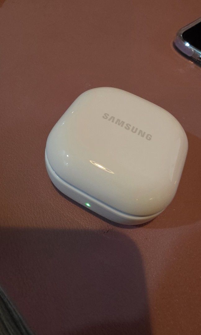 Samsung Galaxy Buds2 wireless earbuds (Category: Earphones) located in San Mateo. Submitted by lei.m (Listing ID 1466254877, Image 2). Description: - Authentic Samsung Galaxy Buds2 (Model: SM-R177) in Purple & White - Premium Sound by AKG with Active Noise Cancellation (ANC) - Excellent battery life for all-day listening - Compact charging case with front status indicator - Clean, sanitized, and ready for pairing -no more box.