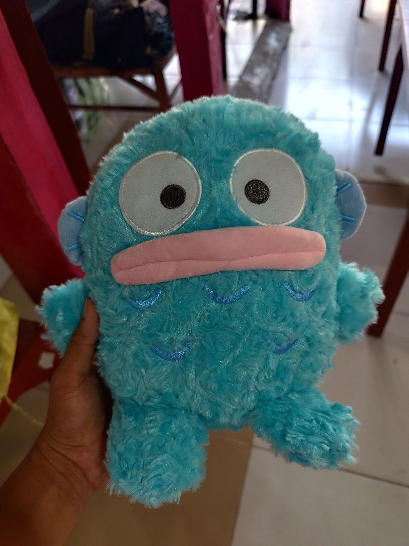 Sanrio Hangyodon fluffy blue plush toy (Category: Plushies & Soft Toys) located in Cordova. Submitted by bsb.streetluxvintage.clothing (Listing ID 1466179966, Image 1). Description: - 100% Authentic Sanrio Hangyodon plushie in bright blue - Super soft, furry texture with cute pink lips - Detailed embroidered scales, side fins, and back spikes - Original tag attached with official Sanrio license label - Perfect for Sanrio collectors and gift-givin