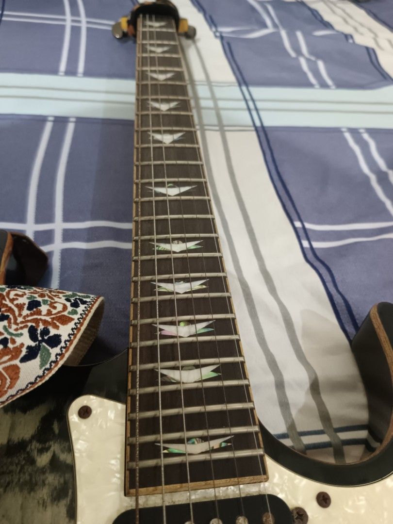 Schecter: Banshee 6 hardtail (Category: Musical Instruments) located in Quezon City. Submitted by giox315 (Listing ID 1466325711, Image 3). Description: - Brand: Schecter Electric Guitar (Banshee 6 Diamond series) - Finish: Gorgeous quilted leopard type - Pickups: Versatile HSS configuration (Schecter pickups) - Hardware & Aesthetics: Chrome hardware, pearloid pickguard, and unique split-arrow fretboard inlays - Push-pull split bridge pick up - C