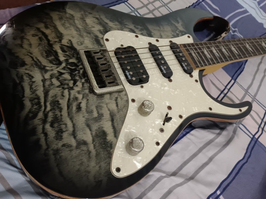 Schecter: Banshee 6 hardtail (Category: Musical Instruments) located in Quezon City. Submitted by giox315 (Listing ID 1466325711, Image 1). Description: - Brand: Schecter Electric Guitar (Banshee 6 Diamond series) - Finish: Gorgeous quilted leopard type - Pickups: Versatile HSS configuration (Schecter pickups) - Hardware & Aesthetics: Chrome hardware, pearloid pickguard, and unique split-arrow fretboard inlays - Push-pull split bridge pick up - C