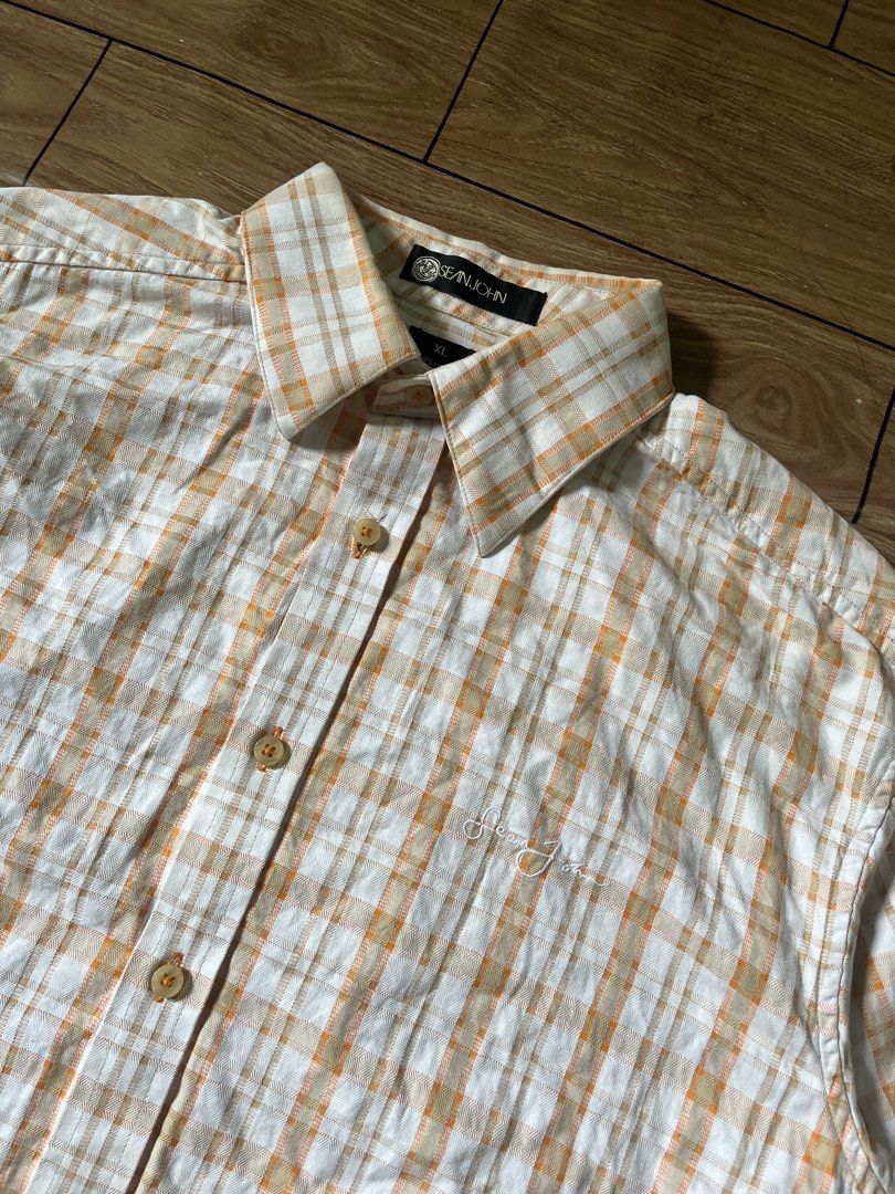 Sean John Plaid Button Up Polo Shirt (Category: Tshirts & Polo Shirts ) located in Manila. Submitted by tvrfinds (Listing ID 1466209590, Image 2). Description: Sean John Plaid Button Up Polo Shirt Size XL on tag Dimes: W - 24 L- 31 -Authentic -Color rate: 9.5/10 -Flawless -Excellent 📩📩.