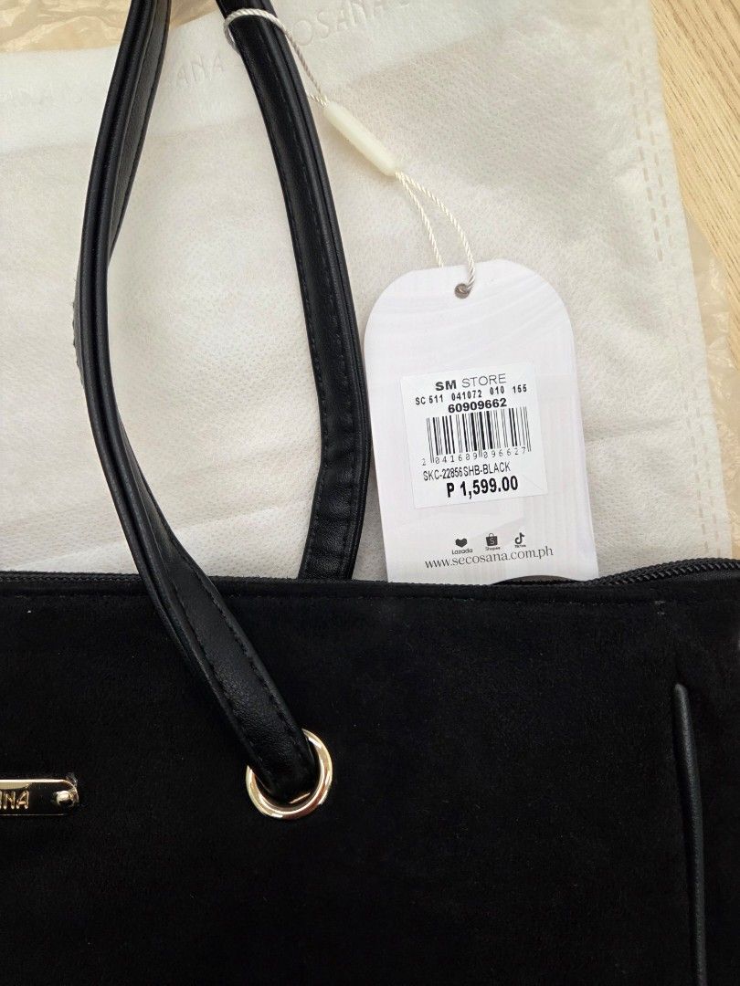 Secosana Kaea Black Shoulder Bag (Category: Shoulder Bags) located in Manila. Submitted by ibnrssa (Listing ID 1466192849, Image 2). Description: SECOSANA Kaea Suede Shoulder Bag Black suede Thin twin shoulder straps Original Price: 1,599 Selling for: 999 (discounted at 899 for 10.10) never been used dust bag included can do shipping, buyer will shoulder sf payo if meet up, around Makati.