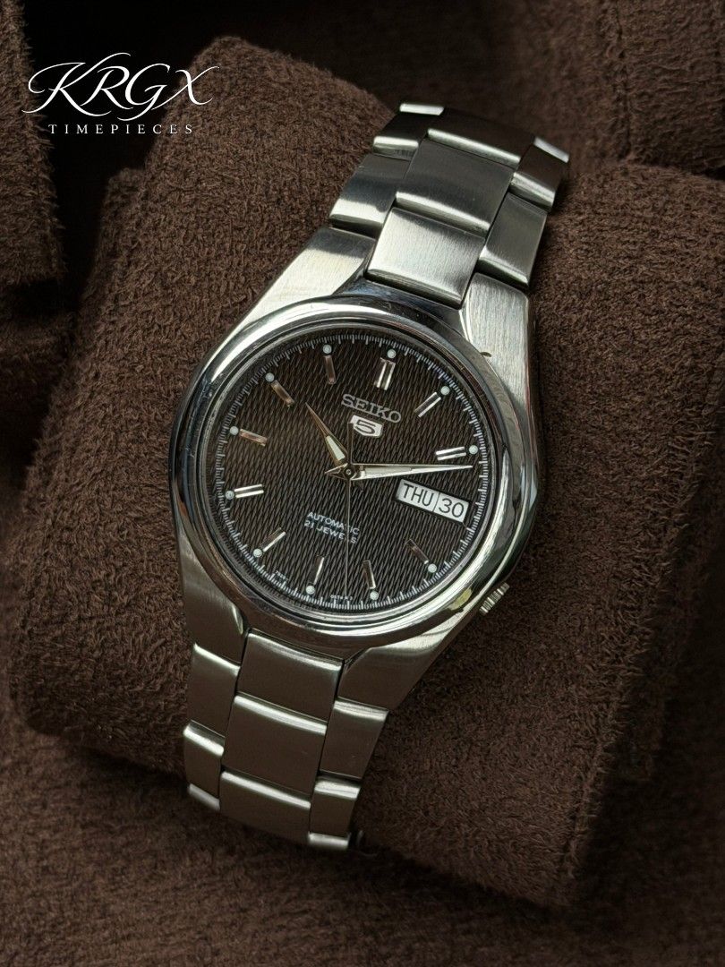 Seiko 5 "Obsidian Snake" (Category: Men's Watches) located in Manila. Submitted by kevin_leal15 (Listing ID 1466220383, Image 1). Description: Seiko 5 "Obsidian Snake" SNK605 A refined featuring a beautifully textured dark dial, sharp applied indices, and a classic stainless steel bracelet. The subtle pattern of the dial gives it character without being loud clean, timeless, and effortlessly sophisticated. ✔️ Movement: 7s26 Automatic ✔️ Case Size
