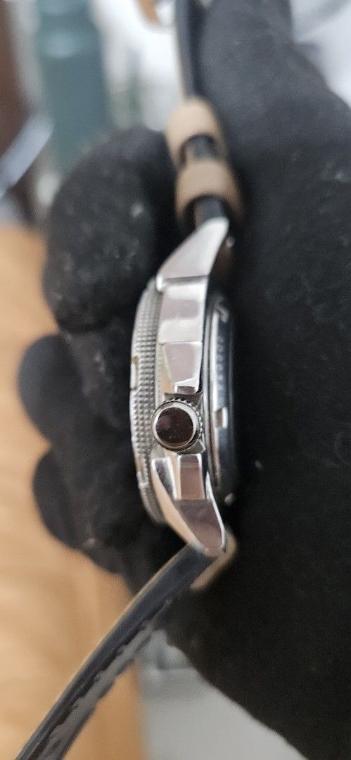 Seiko 5 Sports Automatic Compass Bezel Watch (Category: Men's Watches) located in Santa Maria. Submitted by rommelmateo (Listing ID 1466309057, Image 3). Description: - Authentic Seiko 5 Sports automatic watch with 7S36 movement (23 jewels) - Bold black dial with large 6 and 12 markers and 3 o'clock day-date display - Rotating compass bezel with cardinal directions - 100m water resistance for everyday durability - Unique 4 o'clock signed crown pl