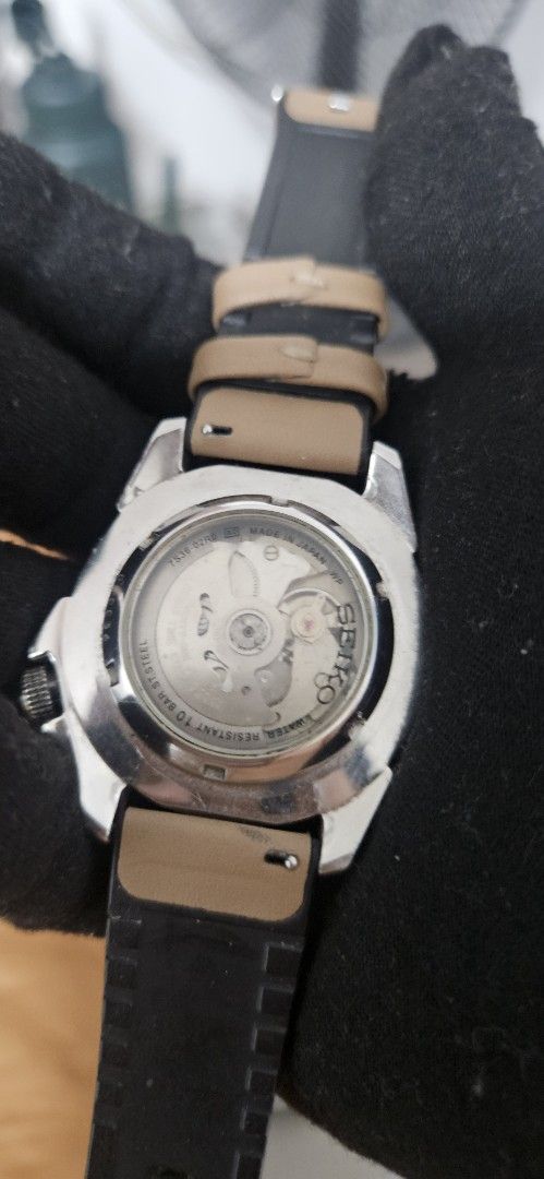 Seiko 5 Sports Automatic Compass Bezel Watch (Category: Men's Watches) located in Santa Maria. Submitted by rommelmateo (Listing ID 1466309057, Image 2). Description: - Authentic Seiko 5 Sports automatic watch with 7S36 movement (23 jewels) - Bold black dial with large 6 and 12 markers and 3 o'clock day-date display - Rotating compass bezel with cardinal directions - 100m water resistance for everyday durability - Unique 4 o'clock signed crown pl