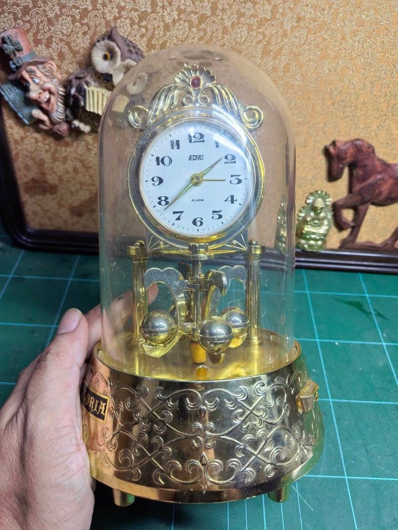 Desk Clock - Mechanical 1 Day Alarm Clock (Category: Clocks) located in Cebu City. Submitted by dudes_villanueva (Listing ID 1466287972, Image 2). Description: Desk Clock - Mechanical 1 Day Alarm Clock 📌 Working Alarm and Clock. 📌 Music Box has issues (Not Working) 📌 May compartment backside. Base Diameter : 5.25 in Height : 8 in.