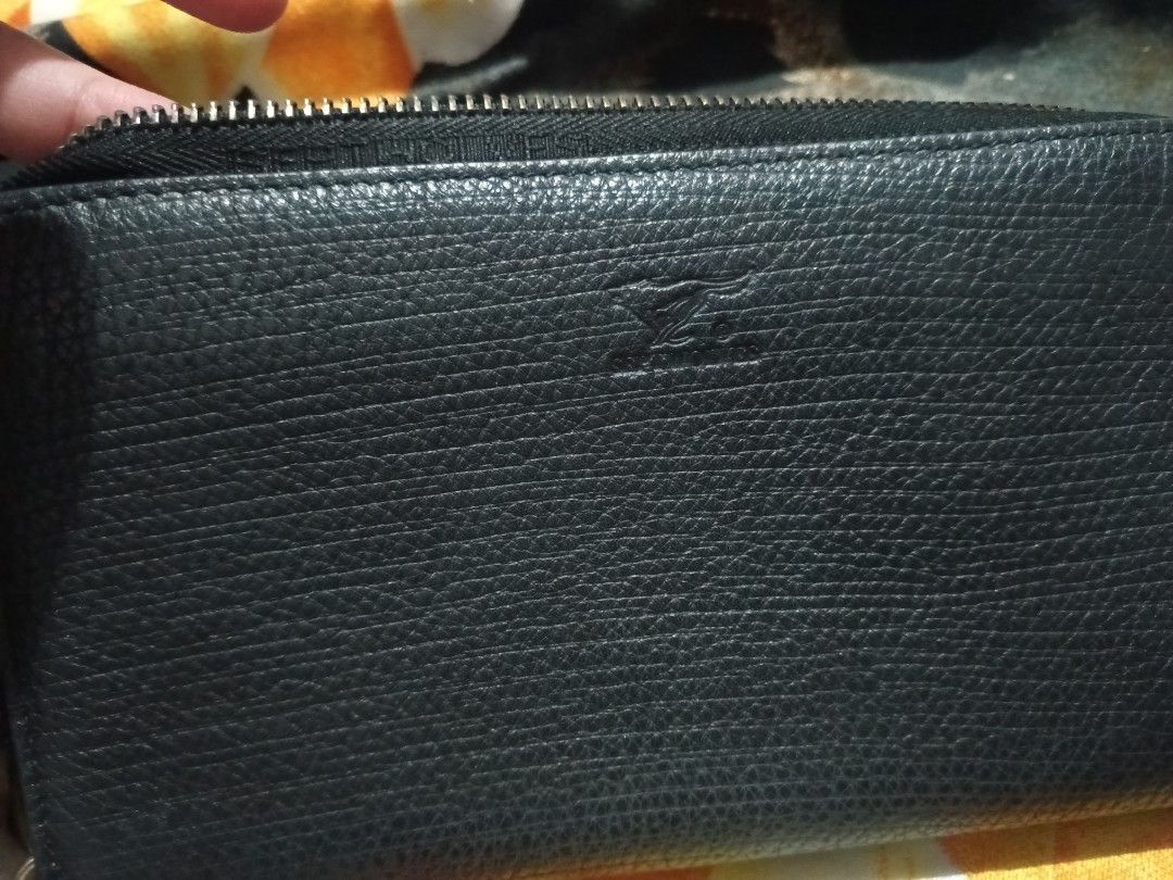 septwolves long wallet (Category: Wallets & Card Holders) located in Tanauan. Submitted by tyrone4 (Listing ID 1466239918, Image 3). Description: Men's Genuine Leather Wallet / Long Clutch Bag good condition as you can see in the piture.