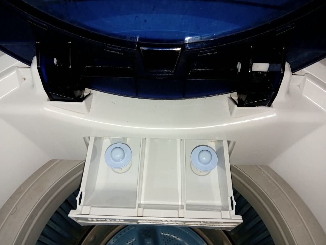 Sharp Top Load Washing Machine Blue White (Category: Washing Machines and Dryers) located in Caloocan City. Submitted by grandmountain_ca5a79 (Listing ID 1466162429, Image 3). Description: - Brand: Sharp Top Load Washing Machine - Color: Clean white with stylish deep blue lid - Features: Standard right-side control panel and convenient pull-out detergent dispenser drawer - Condition: Exterior body is clean with minimal wear; drum and blue pulsato