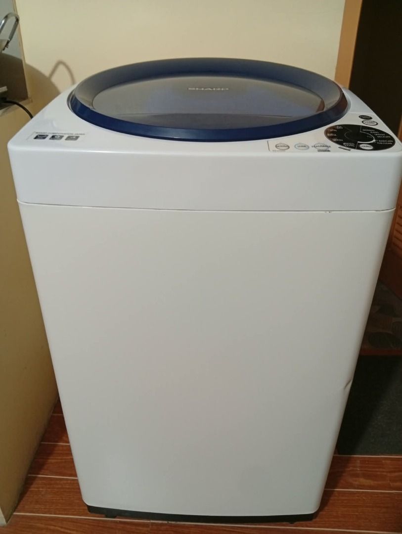 Sharp Top Load Washing Machine Blue White (Category: Washing Machines and Dryers) located in Caloocan City. Submitted by grandmountain_ca5a79 (Listing ID 1466162429, Image 2). Description: - Brand: Sharp Top Load Washing Machine - Color: Clean white with stylish deep blue lid - Features: Standard right-side control panel and convenient pull-out detergent dispenser drawer - Condition: Exterior body is clean with minimal wear; drum and blue pulsato