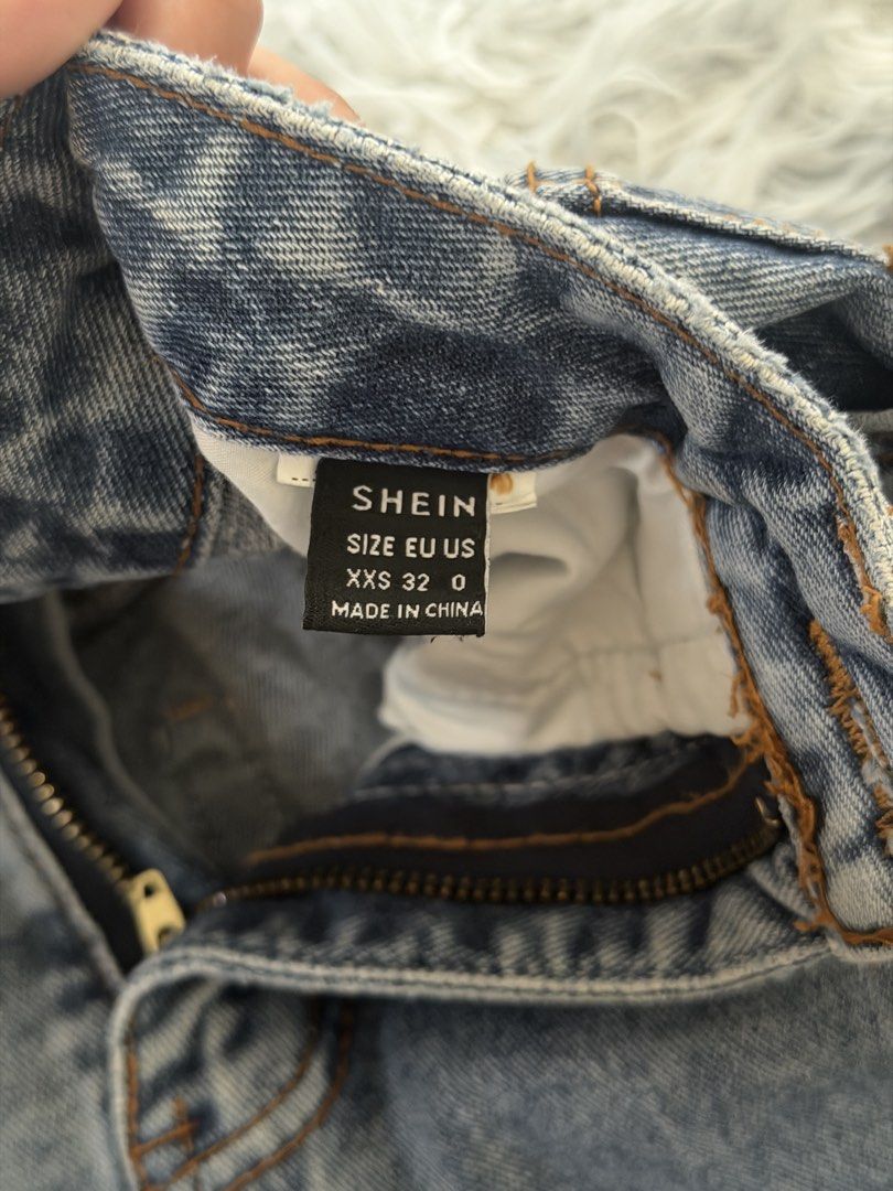 SHEIN Denim Shorts (Category: Shorts) located in Legazpi City. Submitted by chindecluttrs (Listing ID 1466194771, Image 2). Description: - Brand: SHEIN - Style: High-waist light wash denim shorts - Closure: Front button and zipper - Size: XXS (EU 32 / US 0) .