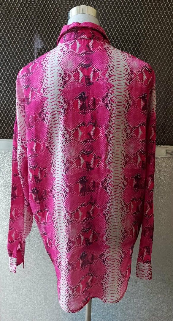SHEIN Pink Snake Print Button Up Blouse Size XS (Category: Blouses) located in Cebu City. Submitted by violacloset (Listing ID 1466224892, Image 3). Description: Measurements: length: 26 width: 23 1/2.
