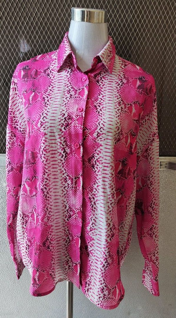 SHEIN Pink Snake Print Button Up Blouse Size XS (Category: Blouses) located in Cebu City. Submitted by violacloset (Listing ID 1466224892, Image 1). Description: Measurements: length: 26 width: 23 1/2.