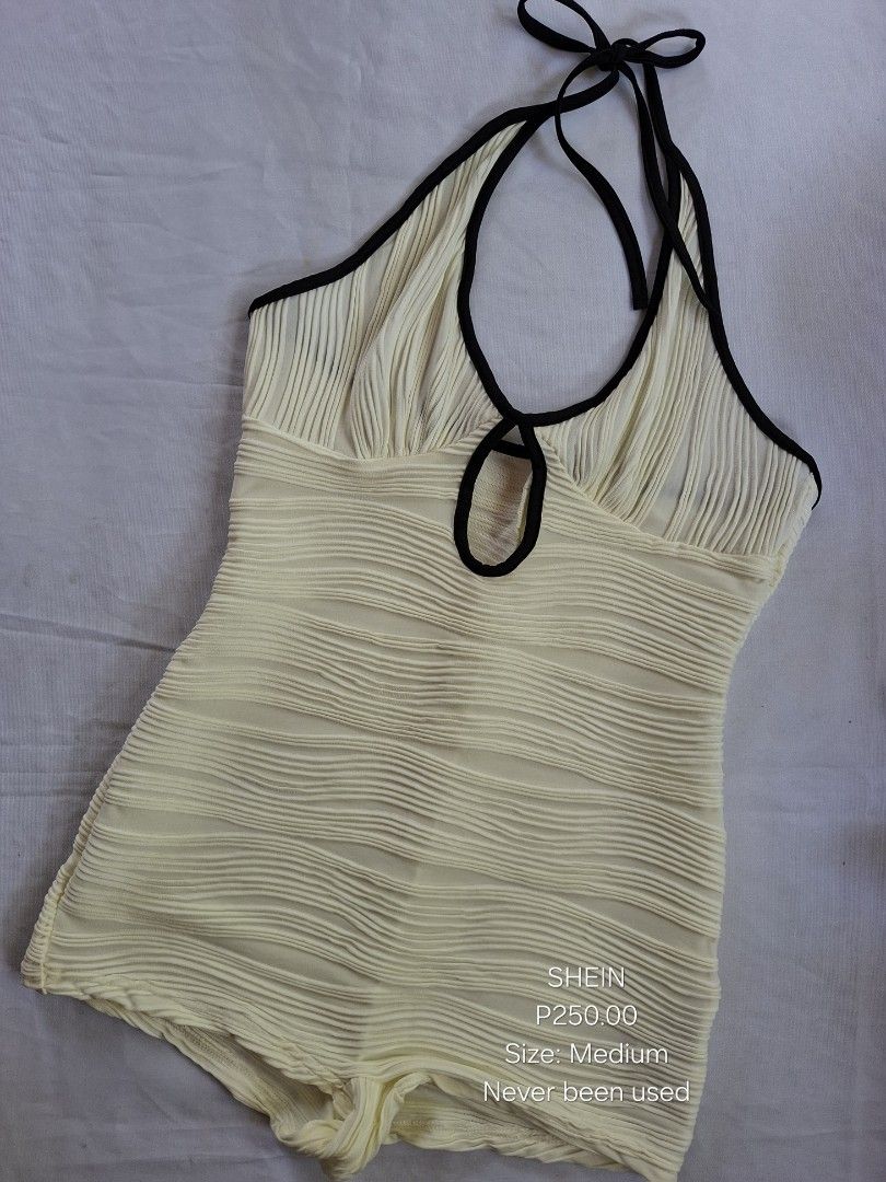 SHEIN V-neck Halter Swimsuit (Category: Bikinis & Swimsuits) located in Silay City. Submitted by rje16 (Listing ID 1466186579, Image 1). Description: 🖤 Shein V-Neck Halter Swimsuit 📏 Size: Medium 🎨 Color: Cream/Black ✨ Condition: New — Never been used 💰 Price: ₱250 📍 Location: Silay City, Negros Occidental 📌 RFS: Wrong size PM if interested! 💌.