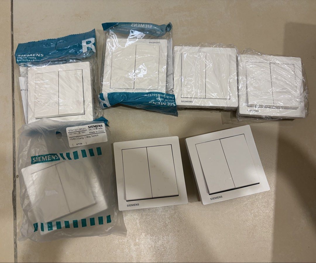 Siemens switch socket (multiple) (Category: Electrical, Adaptors & Sockets) located in Kuala Lumpur. Submitted by saydeeclose (Listing ID 1466274034, Image 3). Description: Siemens switch socket 25 pieces total, price is for all. 4 gang switch (7 pcs new) 3 gang switch (7 pcs new 4 pcs installed only then removed) 2 gang switch (5 pcs new 2 pcs installed then removed) Bought too many. Branded, good quality. Sirim and bought from electrical shop. 