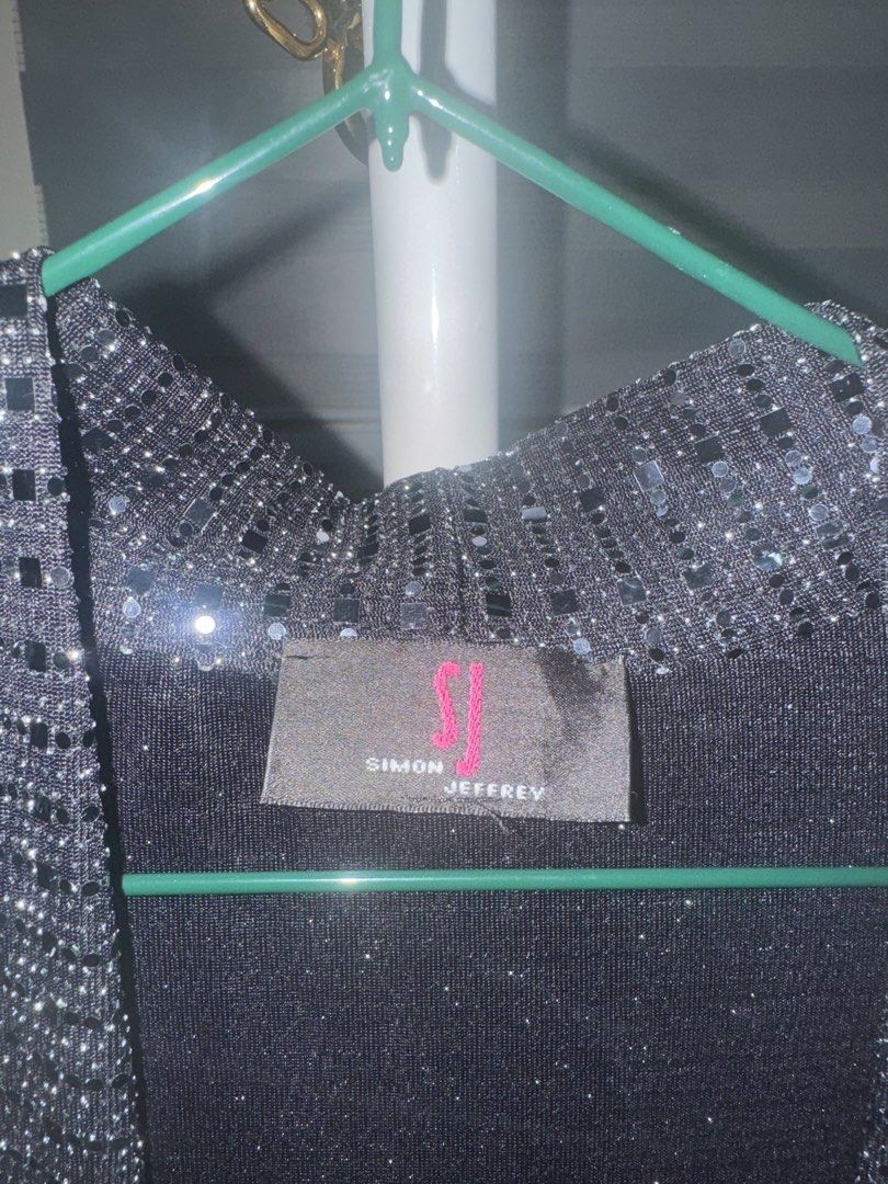 Simon Jeffrey Black Metallic Glitter Open Cardigan (Category: Coats, Jackets and Outerwear) located in La Trinidad. Submitted by prelovedandfindsbyji (Listing ID 1466244971, Image 2). Description: - Brand: Simon Jeffrey - Color: Sparkly black - Style: Open front cardigan with long sleeves - Material: 87% nylon, 8% metallic, 5% elastane - Origin: Made in UK - Care Instructions: Machine wash gentle at 30°C inside out.