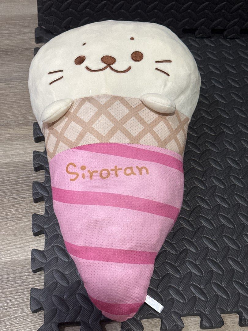 Sirotan Ice Cream Cone Plush Toy (Category: Plushies & Soft Toys) located in Cainta. Submitted by shopbyyna (Listing ID 1466261288, Image 3). Description: - Authentic Sirotan ice cream cone plush collectible - Features a cute white seal head on top with waffle cone and pink striped details - Made with soft, cooling fabric ideal for the PH summer weather - Sirotan logo delicately embroidered across the base - Perfect for kawaii plush collectors an