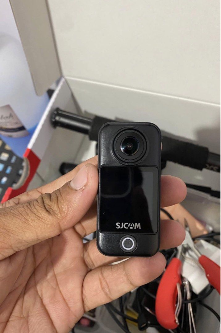 SJCAM action camera black body (Category: Cameras) located in Manila. Submitted by wise.buynsell (Listing ID 1466321409, Image 1). Description: Selling my SJCAM C300 — perfect for motovlogging, travel, biking, POV videos, and content creation! ✅ Fully working — no issues ✅ Good condition ✅ Minimal scratches from normal use, does not affect performance ✅ Free accessories included 🎁 ✅ Compact & lightweight ✅ Great for motovlogging and everyday rec