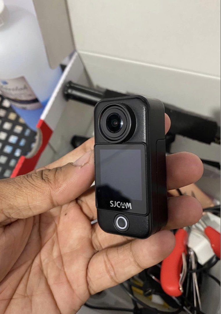 SJCAM action camera black body (Category: Cameras) located in Manila. Submitted by wise.buynsell (Listing ID 1466321409, Image 2). Description: Selling my SJCAM C300 — perfect for motovlogging, travel, biking, POV videos, and content creation! ✅ Fully working — no issues ✅ Good condition ✅ Minimal scratches from normal use, does not affect performance ✅ Free accessories included 🎁 ✅ Compact & lightweight ✅ Great for motovlogging and everyday rec