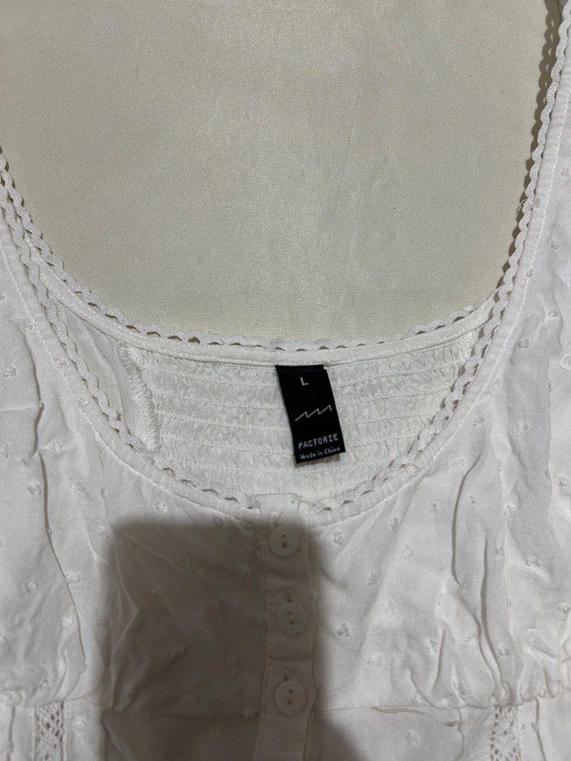 sleeveless button-front cami top (Category: Sleeveless) located in Pagadian. Submitted by yowna_declutters (Listing ID 1466240580, Image 2). Description: good condition loc: pagadian city, mindanao .