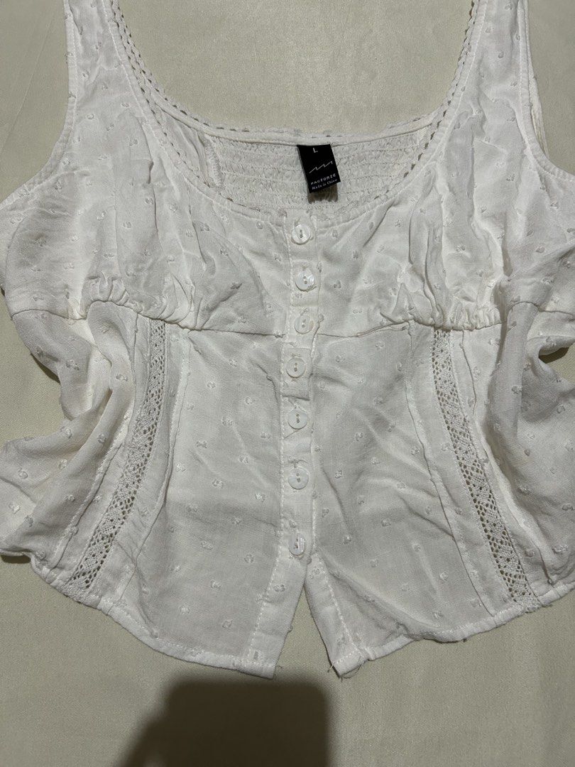 sleeveless button-front cami top (Category: Sleeveless) located in Pagadian. Submitted by yowna_declutters (Listing ID 1466240580, Image 3). Description: good condition loc: pagadian city, mindanao .