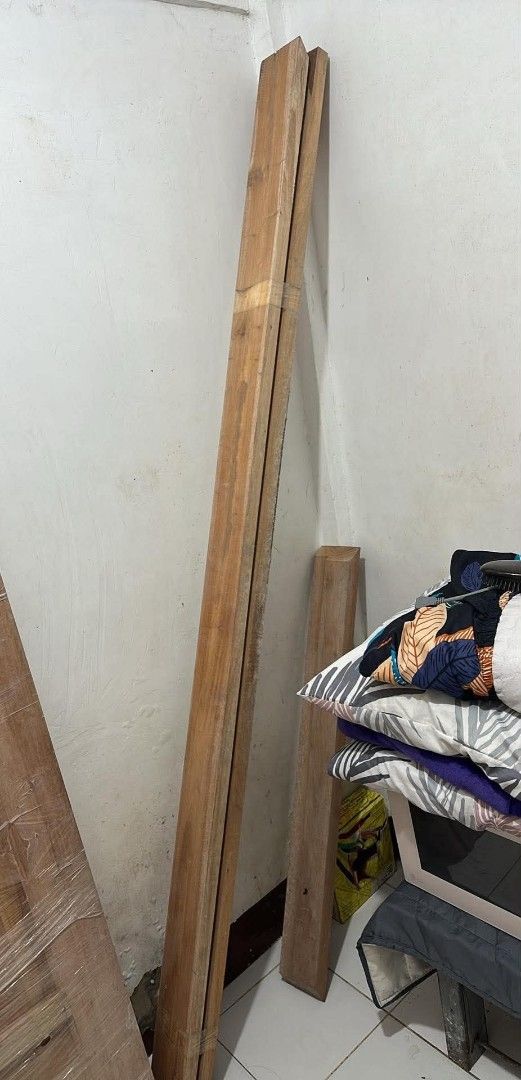 Solid Mahogany Wooden Door (Category: Construction & Building Materials) located in Caloocan City. Submitted by tr3ss (Listing ID 1466187878, Image 2). Description: - Brand: Strong Windoors Trading Corporation - Size: 2x5x100 inches - Condition: Brand new/unused surplus from home renovations - Material: Sturdy solid timber with natural wood grain finish - Ideal for: Door installation and home improvement projects.