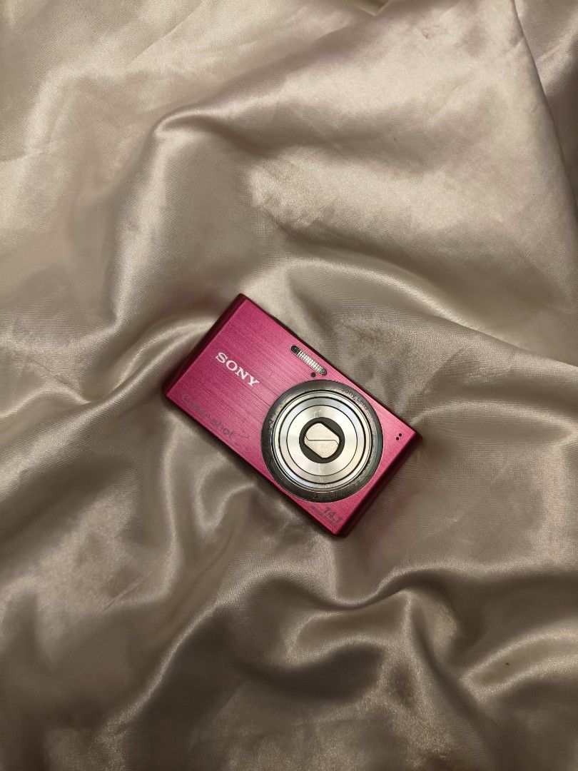 Sony Cyber-shot Pink Digital Camera Full Bundle (Category: Cameras) located in Cebu City. Submitted by suga.rcam (Listing ID 1466173799, Image 1). Description: - Model: Sony Cyber-shot DSC W610 - Color: Stylish Pink 🩷 - Resolution: 14.1 Megapixels for clear, crisp photos - Stabilization: SteadyShot image stabilization to prevent blur - Design: Ultra-compact pocket size with retractable zoom lens - Features: Top-mounted power and shutter buttons,