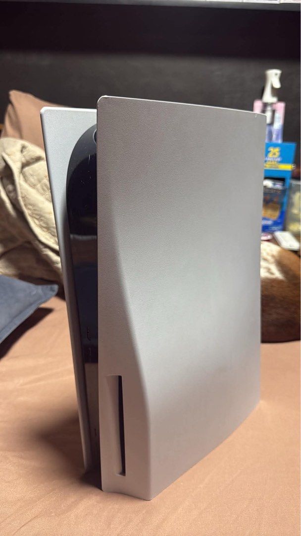 Sony PlayStation 5 Console with Extra Controllers and Custom Plates (Category: PlayStation) located in Caloocan City. Submitted by bosstin8 (Listing ID 1466164434, Image 1). Description: - Complete PS5 bundle ready for multiplayer gaming - Includes main console unit in good working condition - 2 wireless DualSense controllers included - Extra set of stylish pink faceplates included - Shows normal wear on surfaces, functions perfectly.