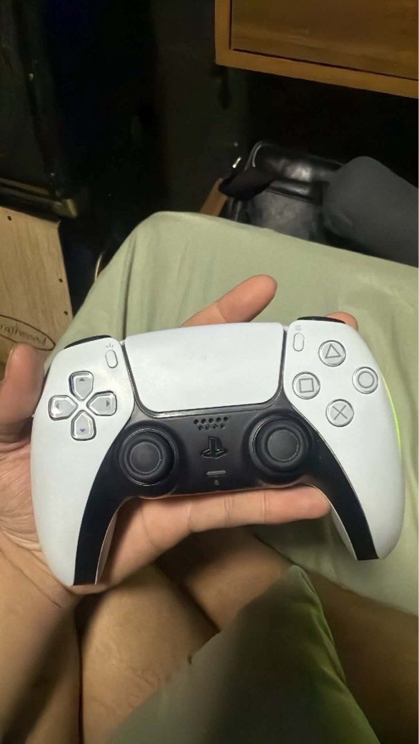 Sony PlayStation 5 Console with Extra Controllers and Custom Plates (Category: PlayStation) located in Caloocan City. Submitted by bosstin8 (Listing ID 1466164434, Image 3). Description: - Complete PS5 bundle ready for multiplayer gaming - Includes main console unit in good working condition - 2 wireless DualSense controllers included - Extra set of stylish pink faceplates included - Shows normal wear on surfaces, functions perfectly.