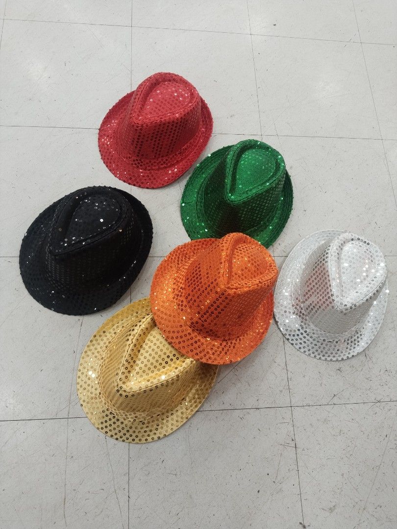 Sparkly Sequin Fedora Hats Assorted Colors Party Hats (Category: Caps & Hats) located in Manila. Submitted by zdmal (Listing ID 1466167171, Image 1). Description: - Product: Colorful Sequin Fedora Hats - Available Colors: Red, green, black, orange, gold, and white - Size: Standard adult size - Features: Shiny, light-catching sequin finish - Best For: Parties, costumes, stage performances, and dance events - Tip: Great accessories to mix and match
