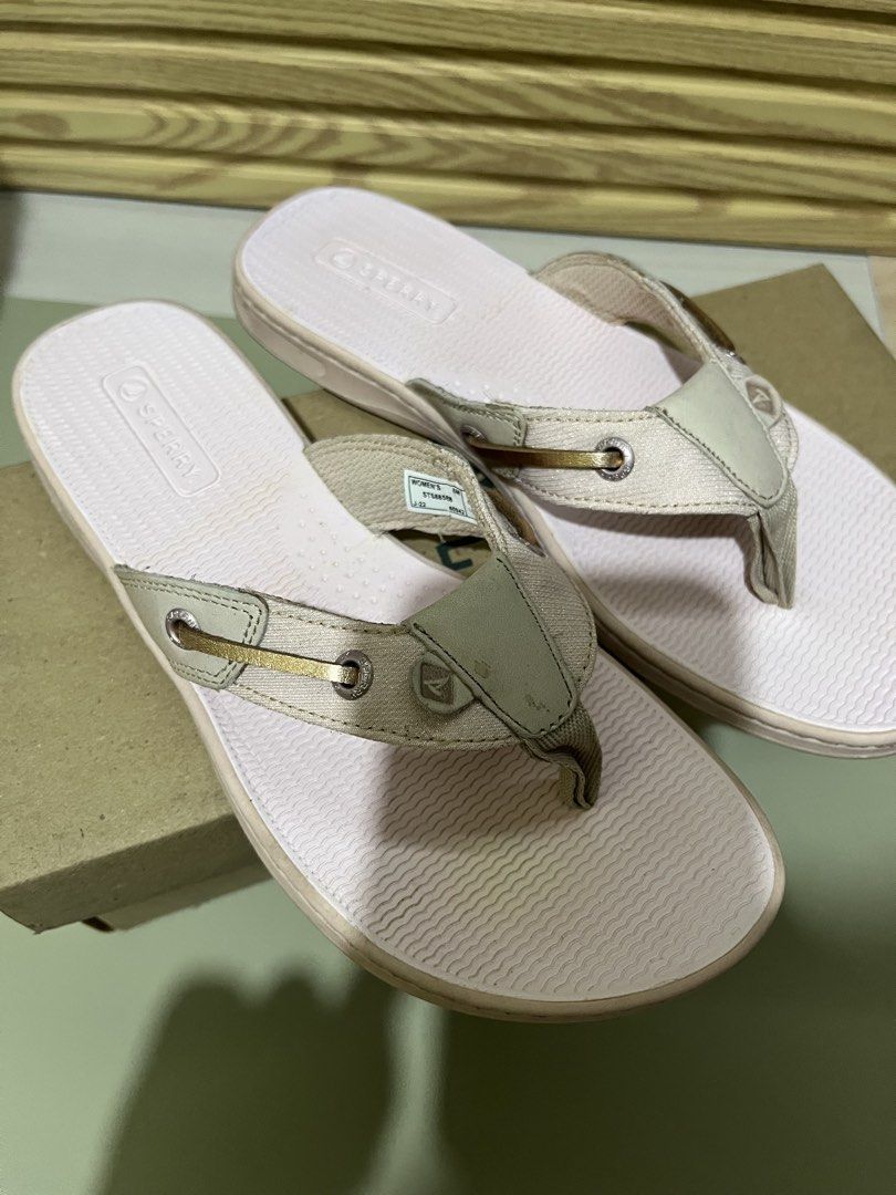 Sperry Seafish Iridescent Rose Flip Flops Size 6 (Category: Slippers and slides) located in Quezon City. Submitted by eloveshopping.ph (Listing ID 1466260305, Image 1). Description: - Brand: Sperry Seafish - Style: Flip flops with boat-shoe strap details and metal eyelets - Color: Iridescent rose / pink textured footbed - Size: Women's 6 M - Condition/Inclusions: Original box included - Ideal for: Casual days and warm weather walks.