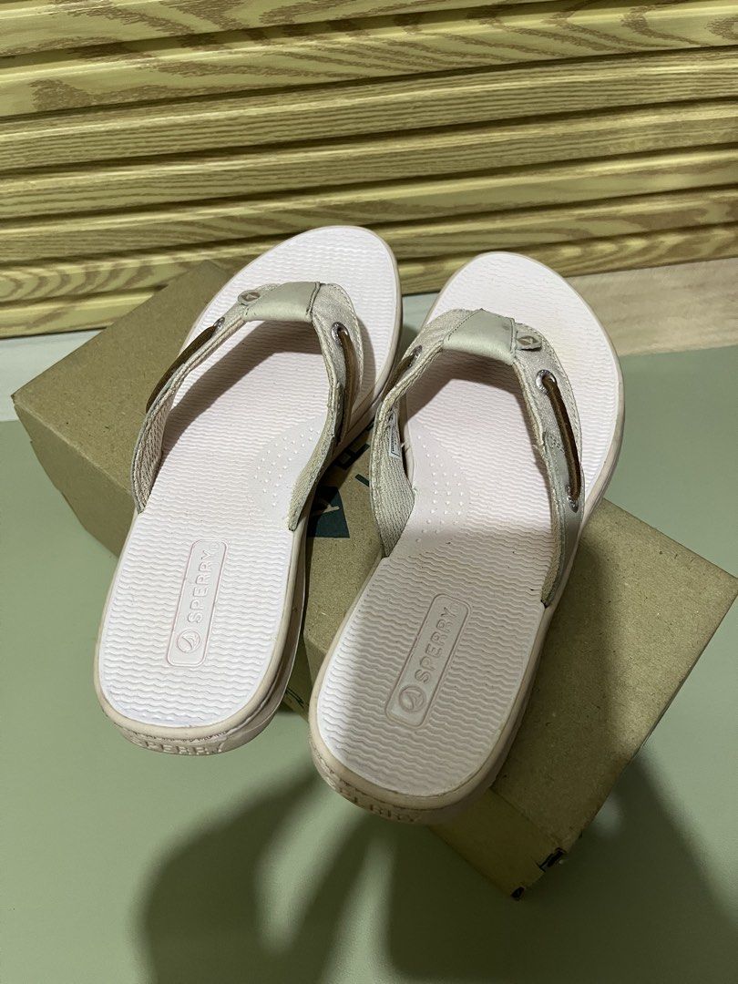 Sperry Seafish Iridescent Rose Flip Flops Size 6 (Category: Slippers and slides) located in Quezon City. Submitted by eloveshopping.ph (Listing ID 1466260305, Image 2). Description: - Brand: Sperry Seafish - Style: Flip flops with boat-shoe strap details and metal eyelets - Color: Iridescent rose / pink textured footbed - Size: Women's 6 M - Condition/Inclusions: Original box included - Ideal for: Casual days and warm weather walks.