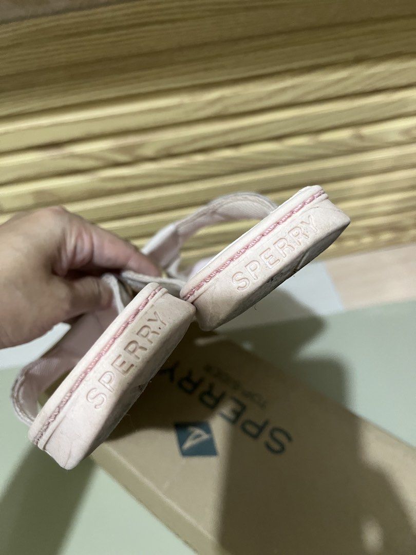 Sperry Seafish Iridescent Rose Flip Flops Size 6 (Category: Slippers and slides) located in Quezon City. Submitted by eloveshopping.ph (Listing ID 1466260305, Image 3). Description: - Brand: Sperry Seafish - Style: Flip flops with boat-shoe strap details and metal eyelets - Color: Iridescent rose / pink textured footbed - Size: Women's 6 M - Condition/Inclusions: Original box included - Ideal for: Casual days and warm weather walks.