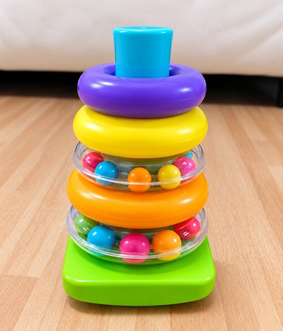 Stacking Donut (Category: Infant Playtime) located in Makati City. Submitted by monicaelise (Listing ID 1466317219, Image 1). Description: helps improve hand eye coordination like new.