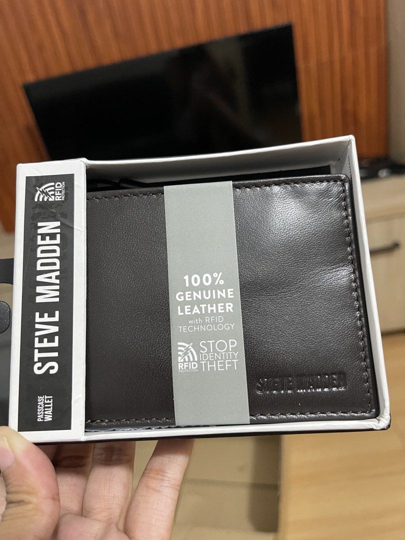 Steve Madden Passcase Wallet Brown Leather (Category: Wallets & Card holders) located in Manila. Submitted by jvlni (Listing ID 1466334016, Image 1). Description: - Brand: Steve Madden - Style: Men's Passcase Wallet - Color: Brown - Material: 100% Genuine Leather - Security: Built-in RFID blocking technology to prevent identity theft - Condition: Brand new, comes with original box and tags fully intact.