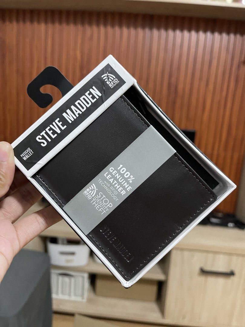 Steve Madden Passcase Wallet Brown Leather (Category: Wallets & Card holders) located in Manila. Submitted by jvlni (Listing ID 1466334016, Image 3). Description: - Brand: Steve Madden - Style: Men's Passcase Wallet - Color: Brown - Material: 100% Genuine Leather - Security: Built-in RFID blocking technology to prevent identity theft - Condition: Brand new, comes with original box and tags fully intact.