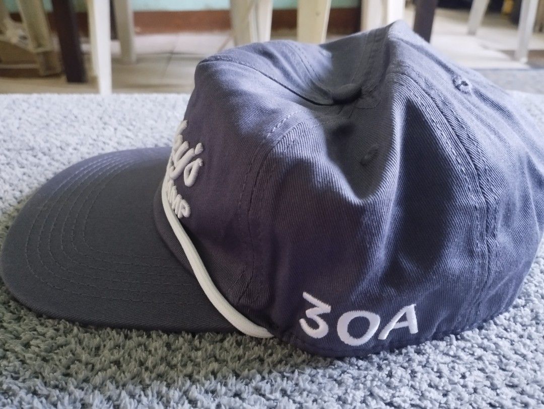Stinky's Fish Camp 30A Rope Snapback Cap Grey (Category: Caps & Hats) located in Manila. Submitted by happycaps (Listing ID 1466179929, Image 2). Description: - Brand/Source: Stinky's Fish Camp - Color: Grey with a stylish white rope across the brim - Details: Embroidered front lettering and '30A' on the side - Closure: Adjustable white plastic snapback strap - Condition: Includes original interior tag inside the crown.