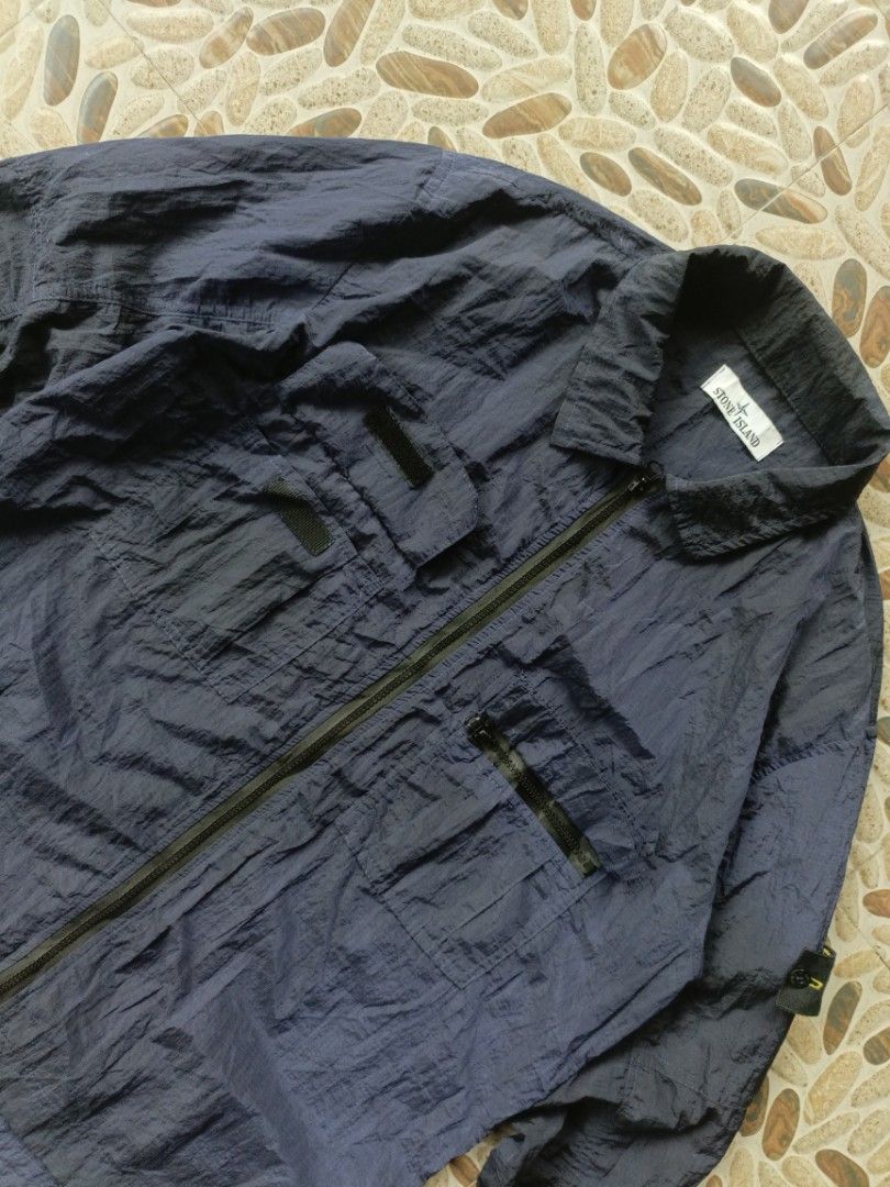 Stone Island Windbreaker (Category: Coats, Jackets and Outerwear) located in Hagonoy. Submitted by erwin0825 (Listing ID 1466248361, Image 2). Description: Stone Island XL on tag Excellent condition No issue Sobrang solid.