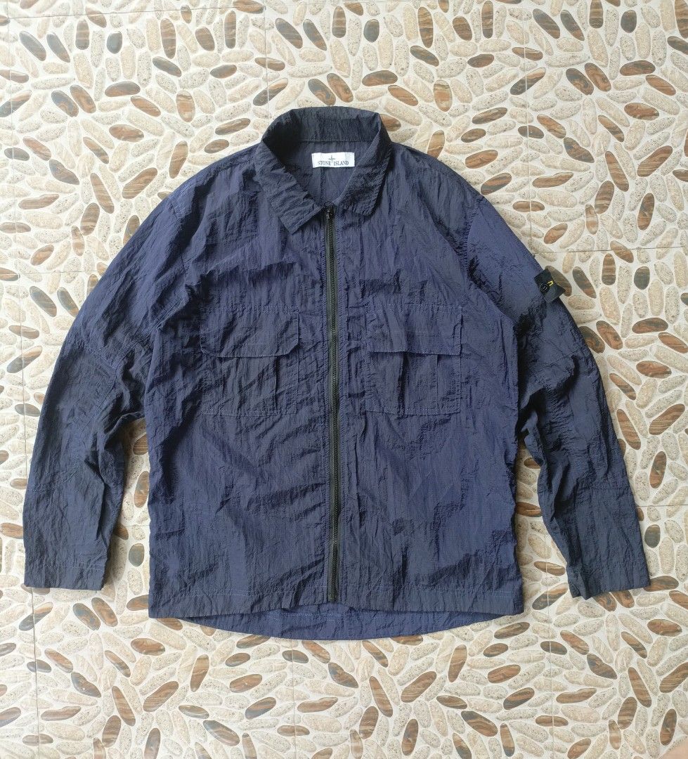 Stone Island Windbreaker (Category: Coats, Jackets and Outerwear) located in Hagonoy. Submitted by erwin0825 (Listing ID 1466248361, Image 1). Description: Stone Island XL on tag Excellent condition No issue Sobrang solid.